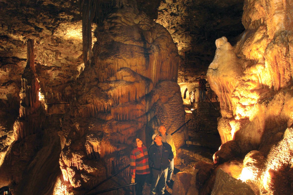 group of people touring caves